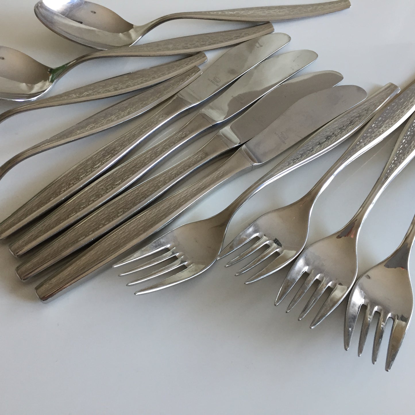 Berndorf Stainless Steel Flatware Set of 12 for 4 Persons: Spoons, Knives, Forks