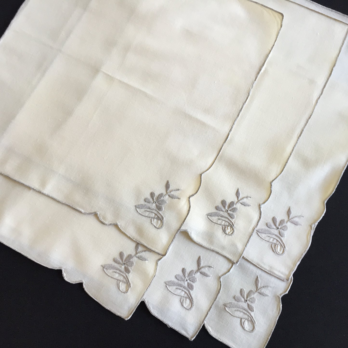 A Set of 6 Hand Embroidered Vintage Beige and Grey Cotton Napkins