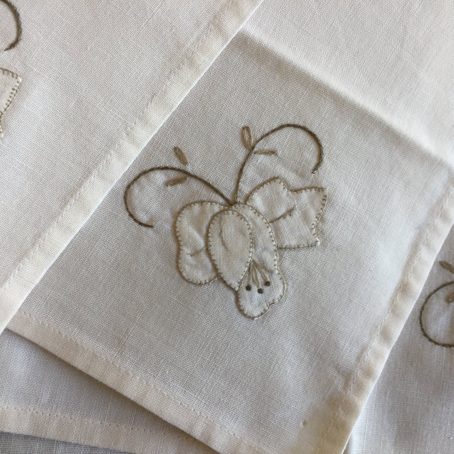 A Vintage Set of 4 Hand Embroidered Floral Beige Reusable Napkins