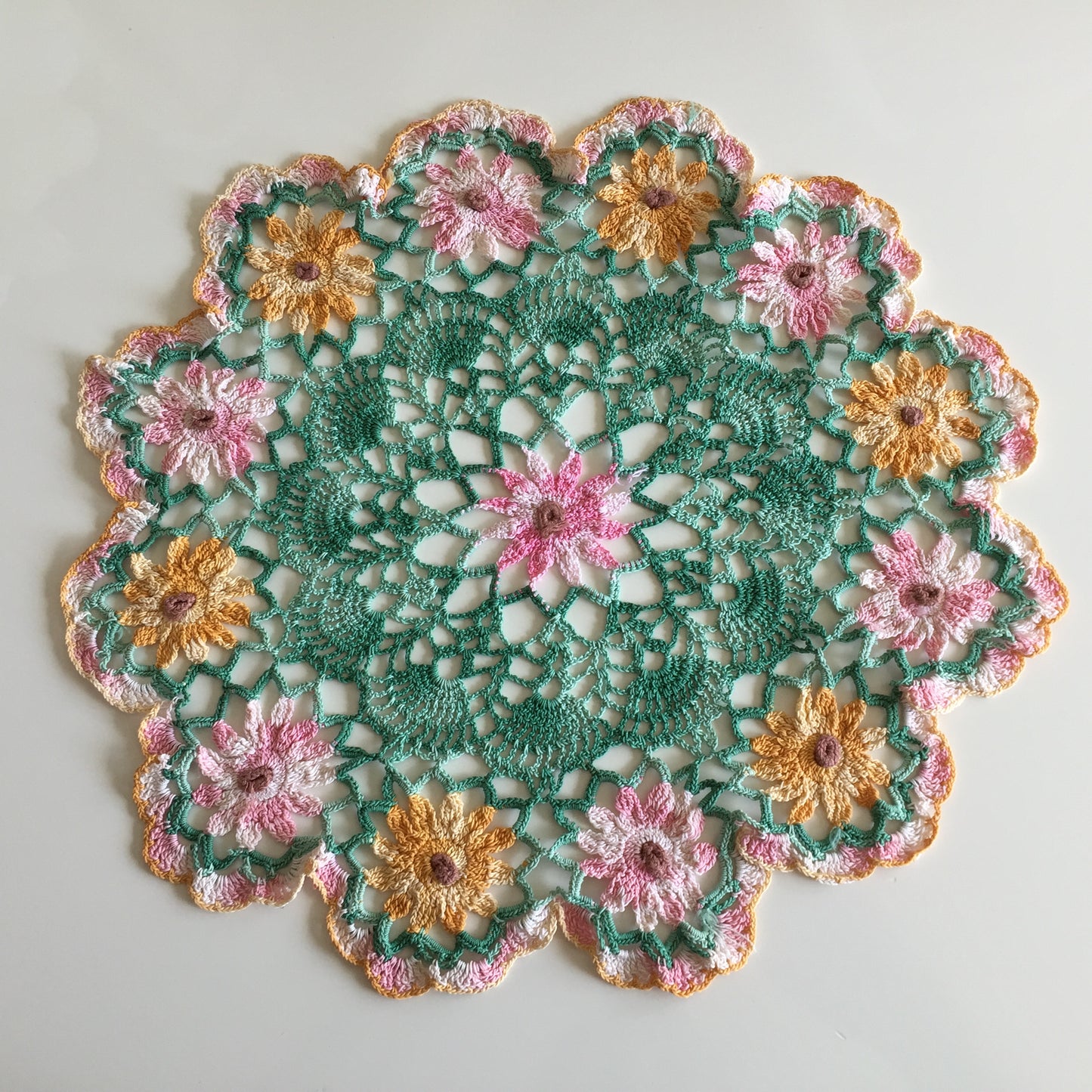 Vintage Crochet Lace Doily or Table Centre Mat with Pink and Orange Floral Pattern