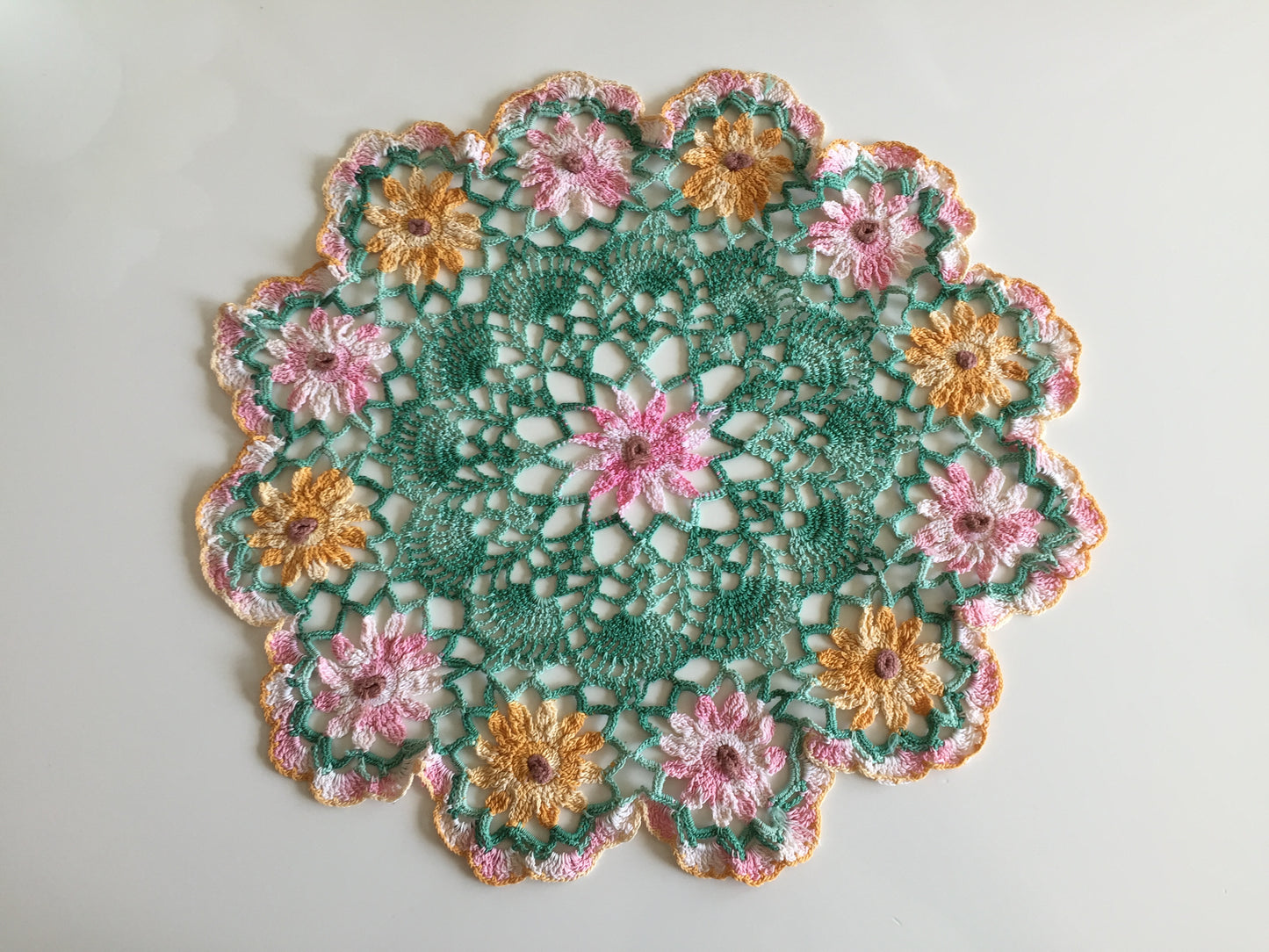 Vintage Crochet Lace Doily or Table Centre Mat with Pink and Orange Floral Pattern