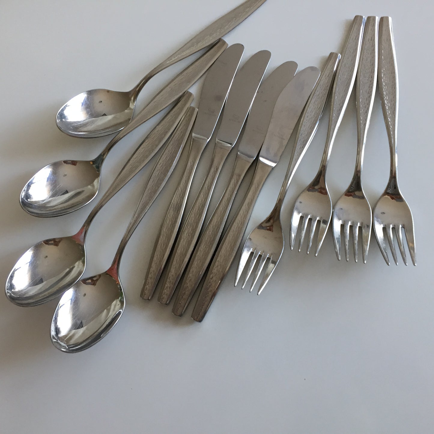 Berndorf Stainless Steel Flatware Set of 12 for 4 Persons: Spoons, Knives, Forks