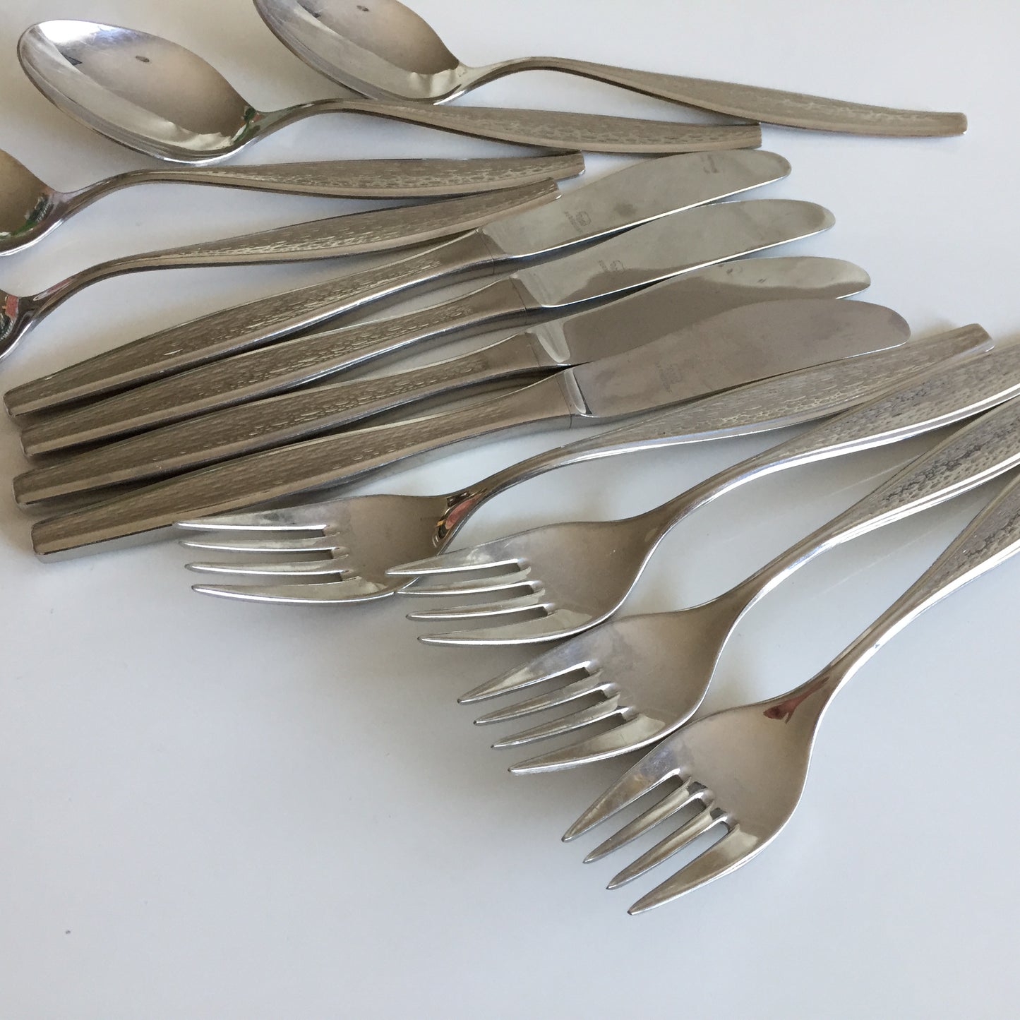 Berndorf Stainless Steel Flatware Set of 12 for 4 Persons: Spoons, Knives, Forks
