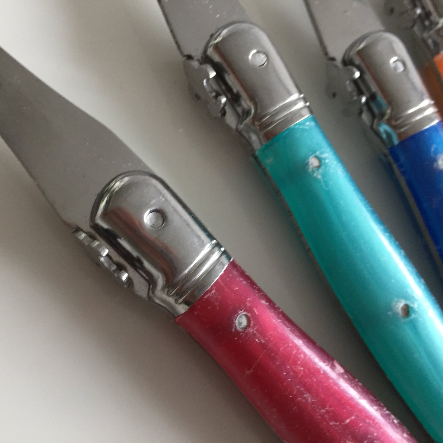 17 Pieces of French Laguiole Cutlery with Fleur-de-Lis on Funky Neon Resin Handles