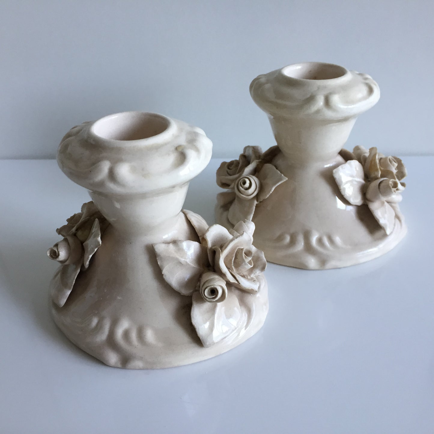 A Pair of Italian Handcrafted Ceramic Candlestick Holders with Capodimonte Style Flowers