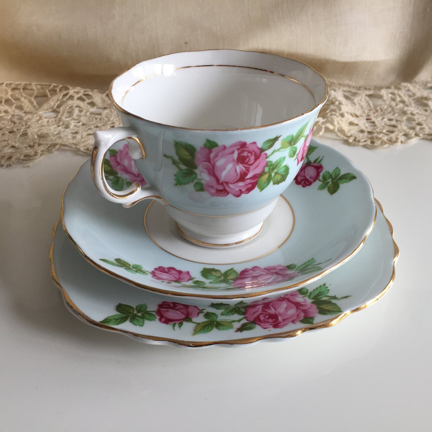 Vintage Porcelain Demitasse Trio with Rose Pattern: Teacup, Saucer & Dessert Plate