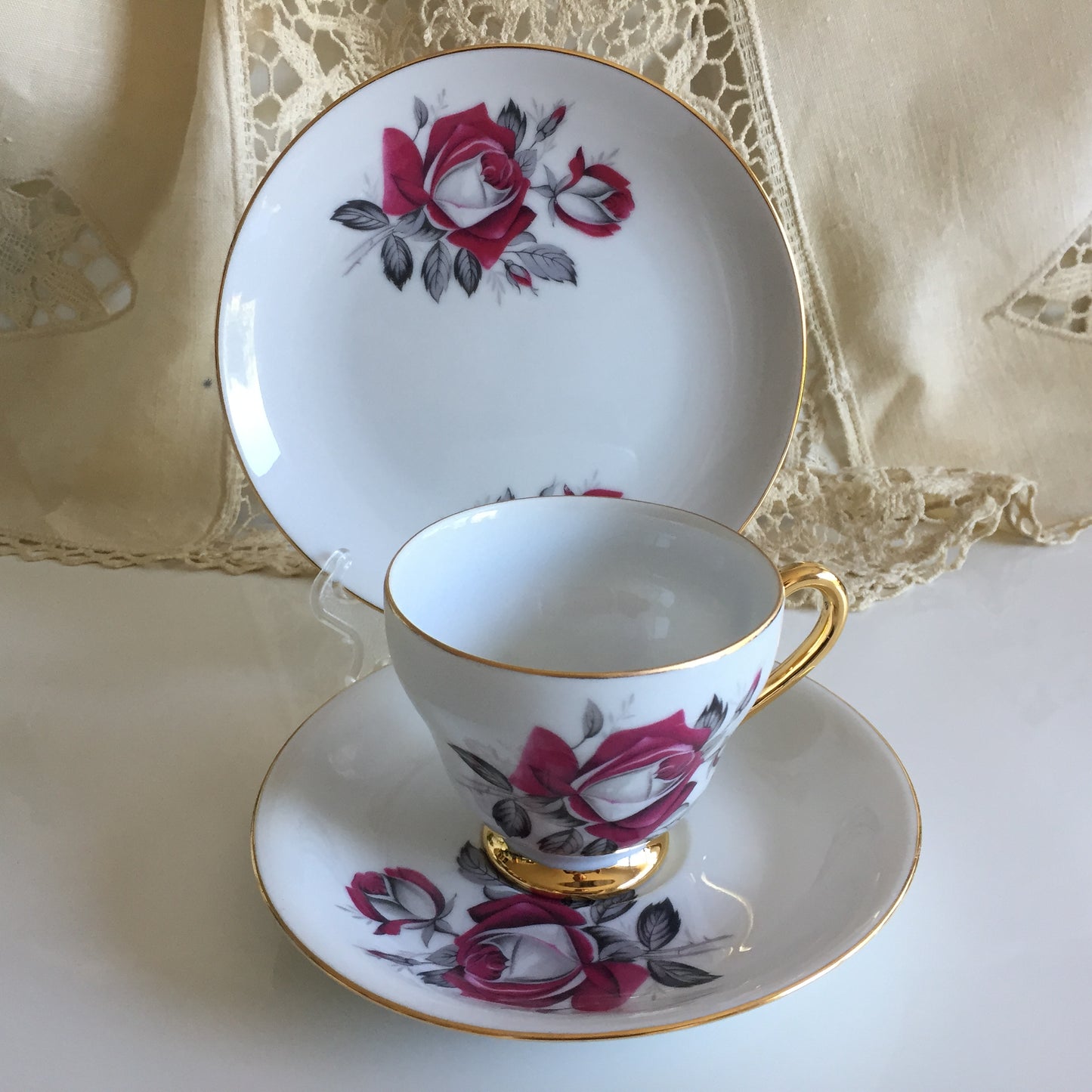 Vintage Porcelain Demitasse Trio with Rose Pattern: Teacup, Saucer & Dessert Plate