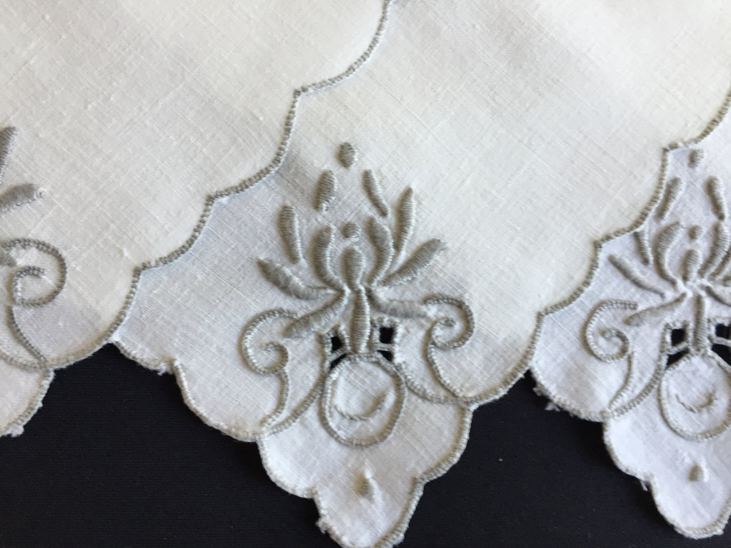 A Set of 4 Madeira Embroidered Cloth Napkins with Scalloped Edging