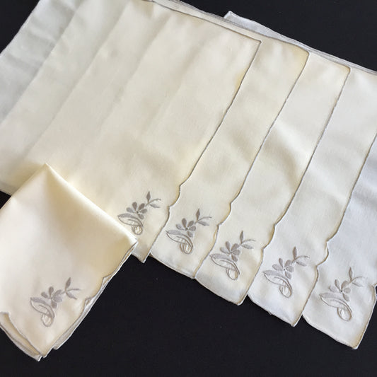 A Set of 6 Hand Embroidered Vintage Beige and Grey Cotton Napkins