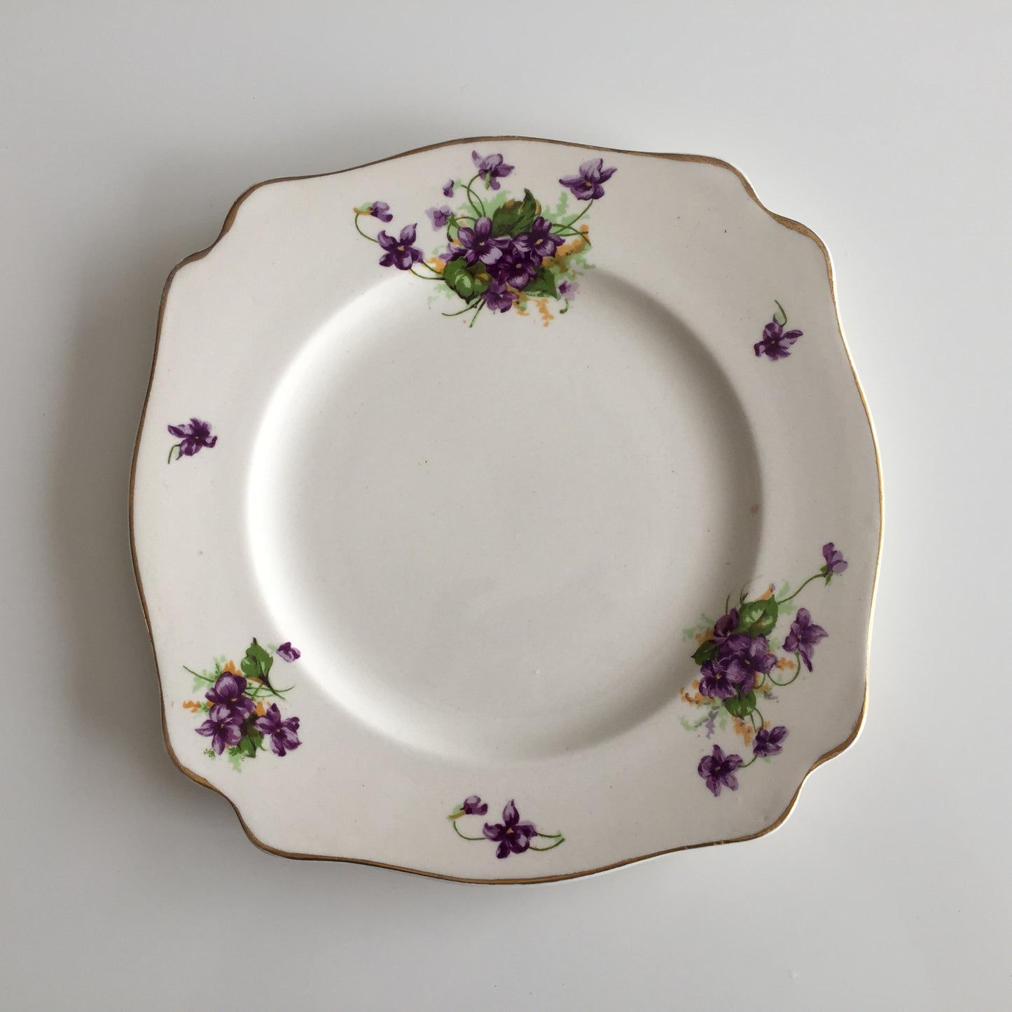 Assorted Vintage Porcelain with Violets Pattern, Teacups, Plates, Bowls