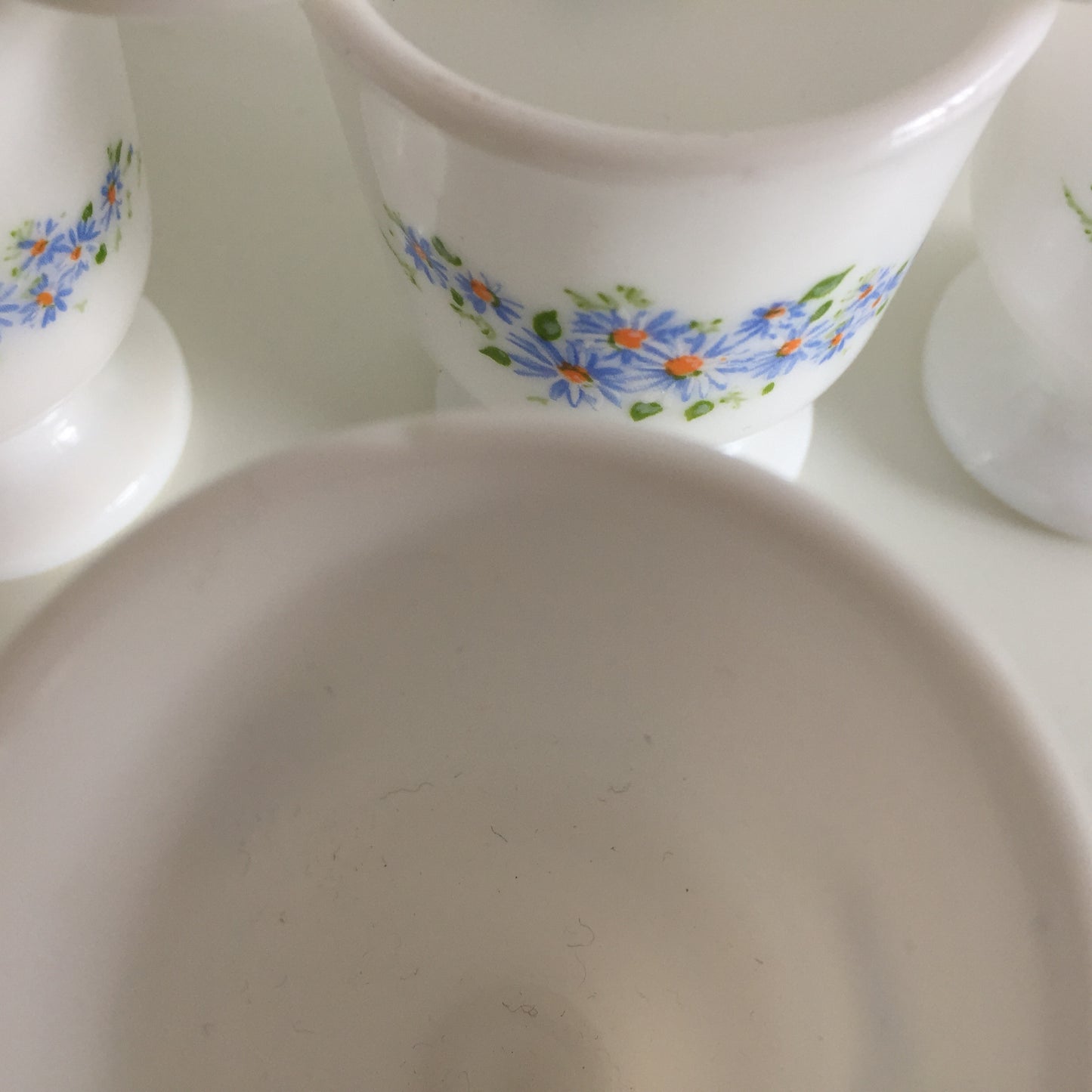 A Pair of Vintage Arcopal France Tempered Milk Glass Egg Cups | Blue Floral