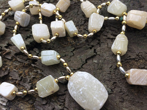 Natural White Stone or Rough Crystal and Gold and Silver Tone Metal Beaded Necklace with Pendant