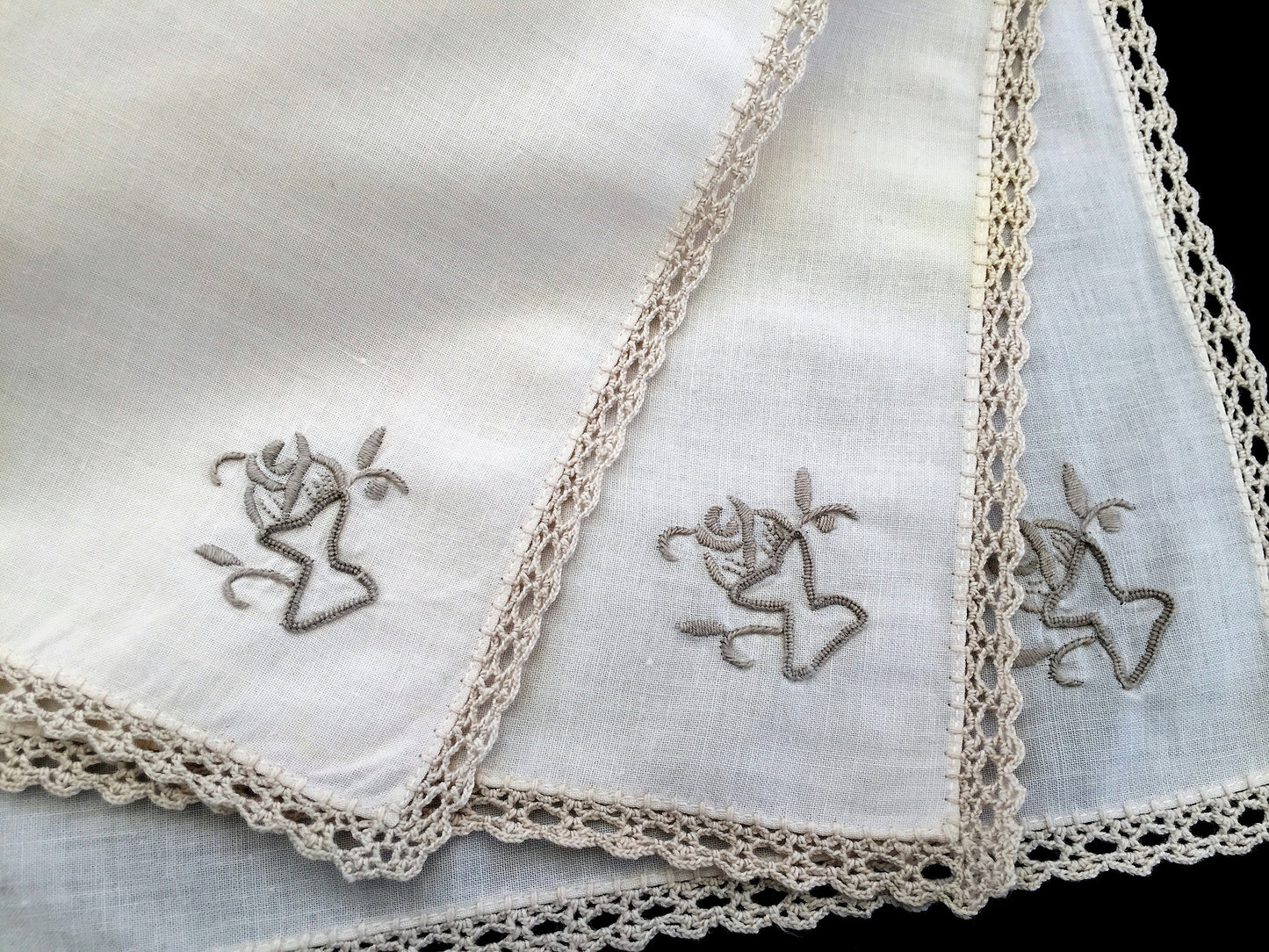 A Set of 3 Hand Embroidered Vintage Ivory Linen Napkins with Ecru Crochet Lace Edging